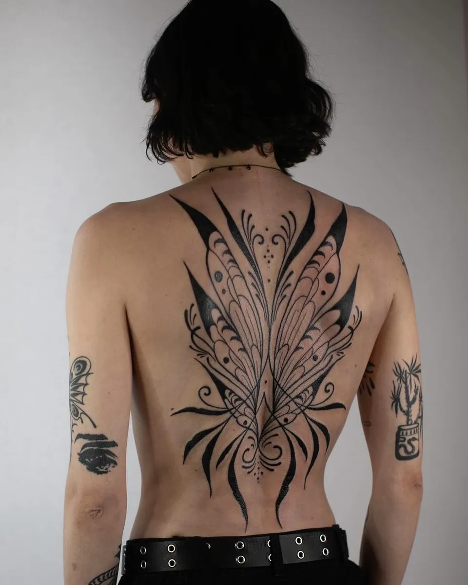 Butterfly-wing ornament covering the back