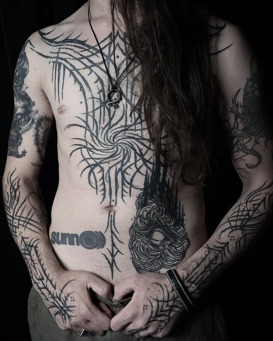 Thorny chest ornament and blackwork sleeves, second view