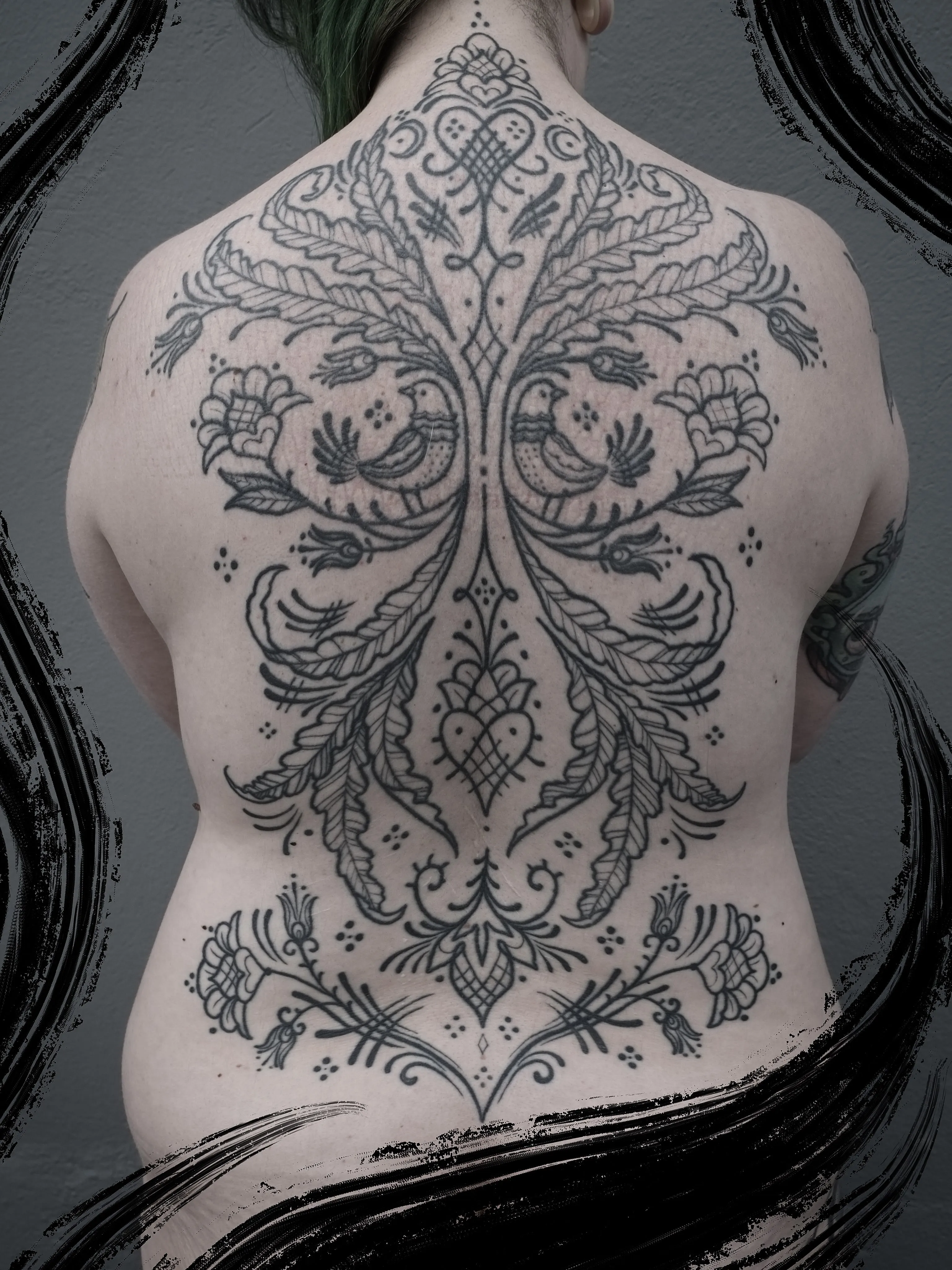 Full backpiece of folk ornament with birds and flowers
